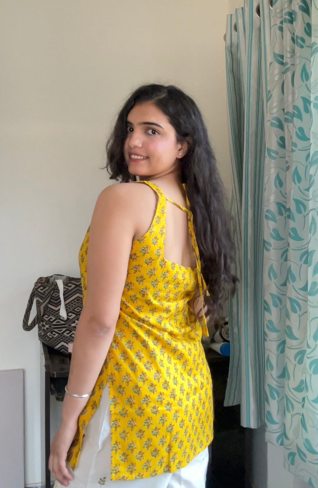 Yellow Printed Sleeveless Short Kurti