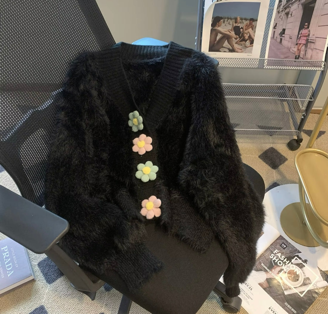 Black fluffy cardigan with daisy floral buttons for winter wear