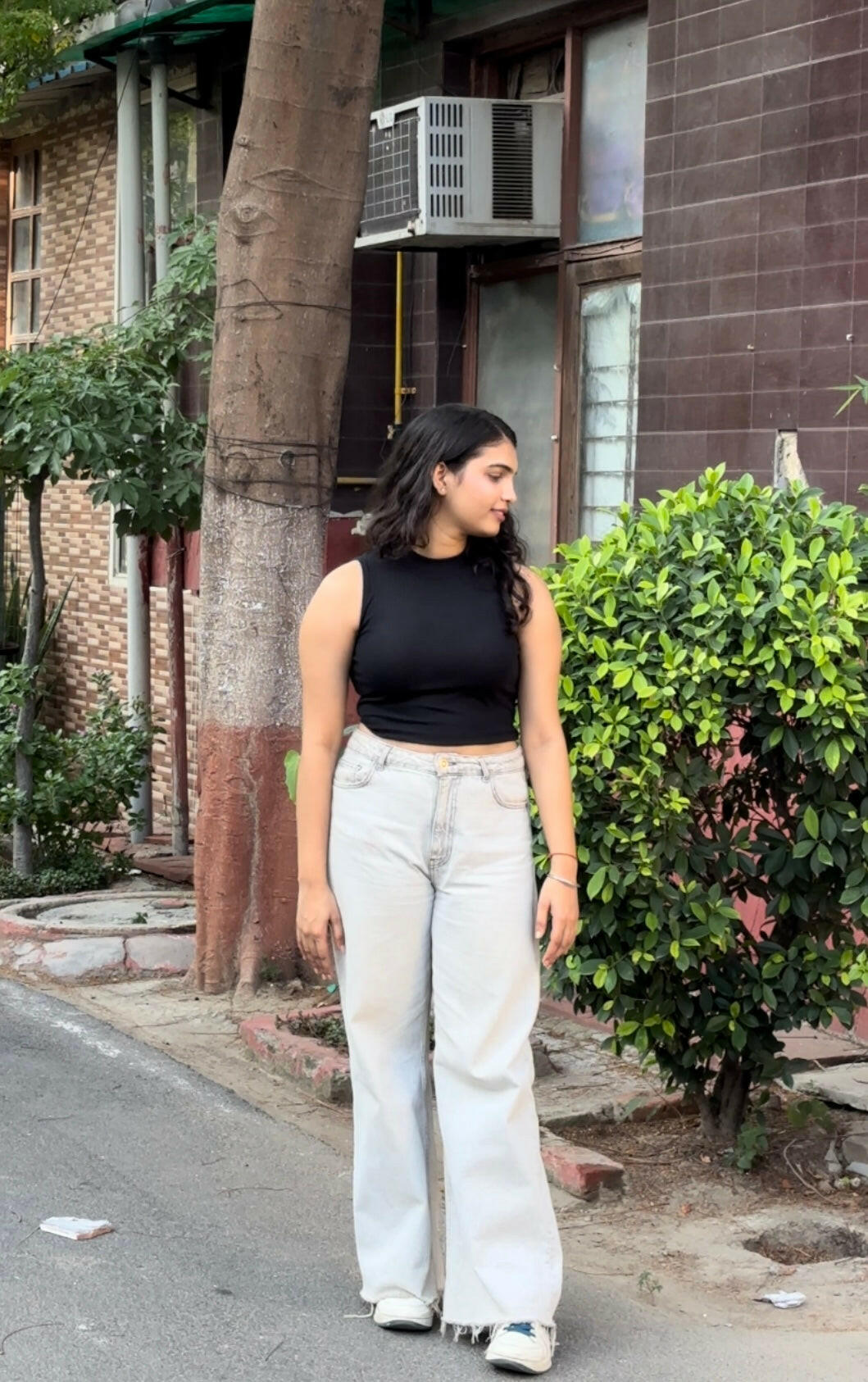 Black sleeveless crop top - chic and comfortable for casual or office wear