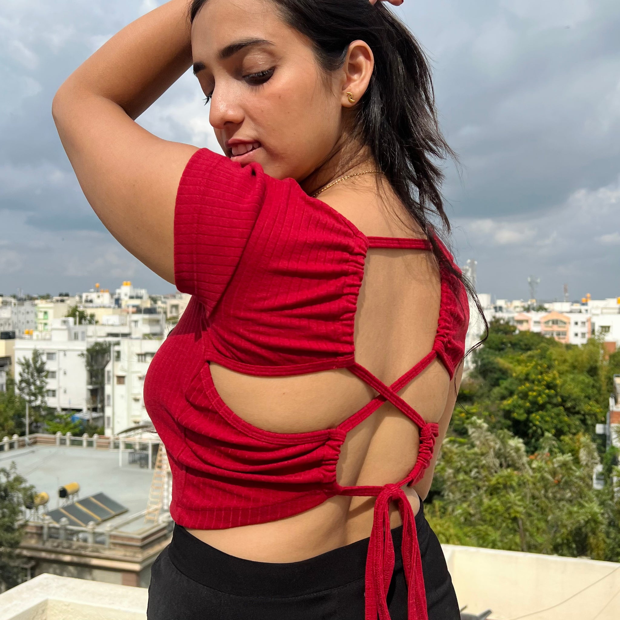 Classic red criss-cross back tie crop top for women - chic and versatile for any occasion.