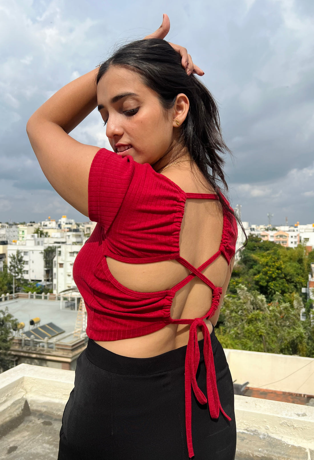 Classic red criss-cross back tie crop top for women - chic and versatile for any occasion.