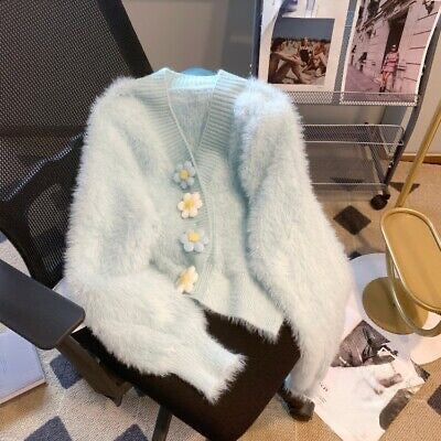 Pastel blue fuzzy cardigan with floral buttons for women