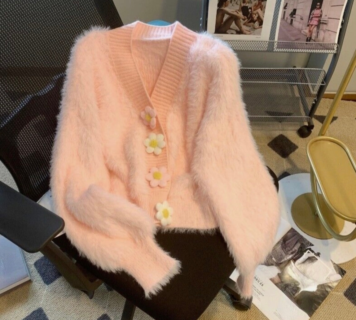 Peach fuzzy woolen cardigan with bow details for winter wear