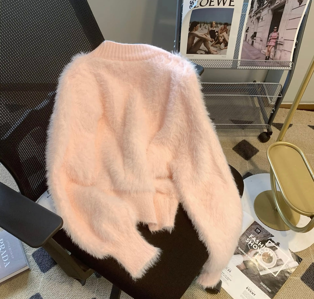 Peach fuzzy woolen cardigan with bow details for winter wear